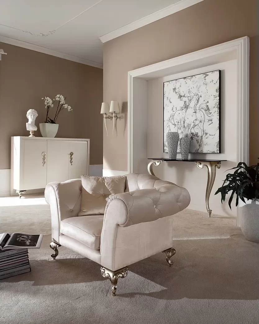 George armchair by Cantori with tufted back and shaped feet, 121 cm wide, in a luxury living room