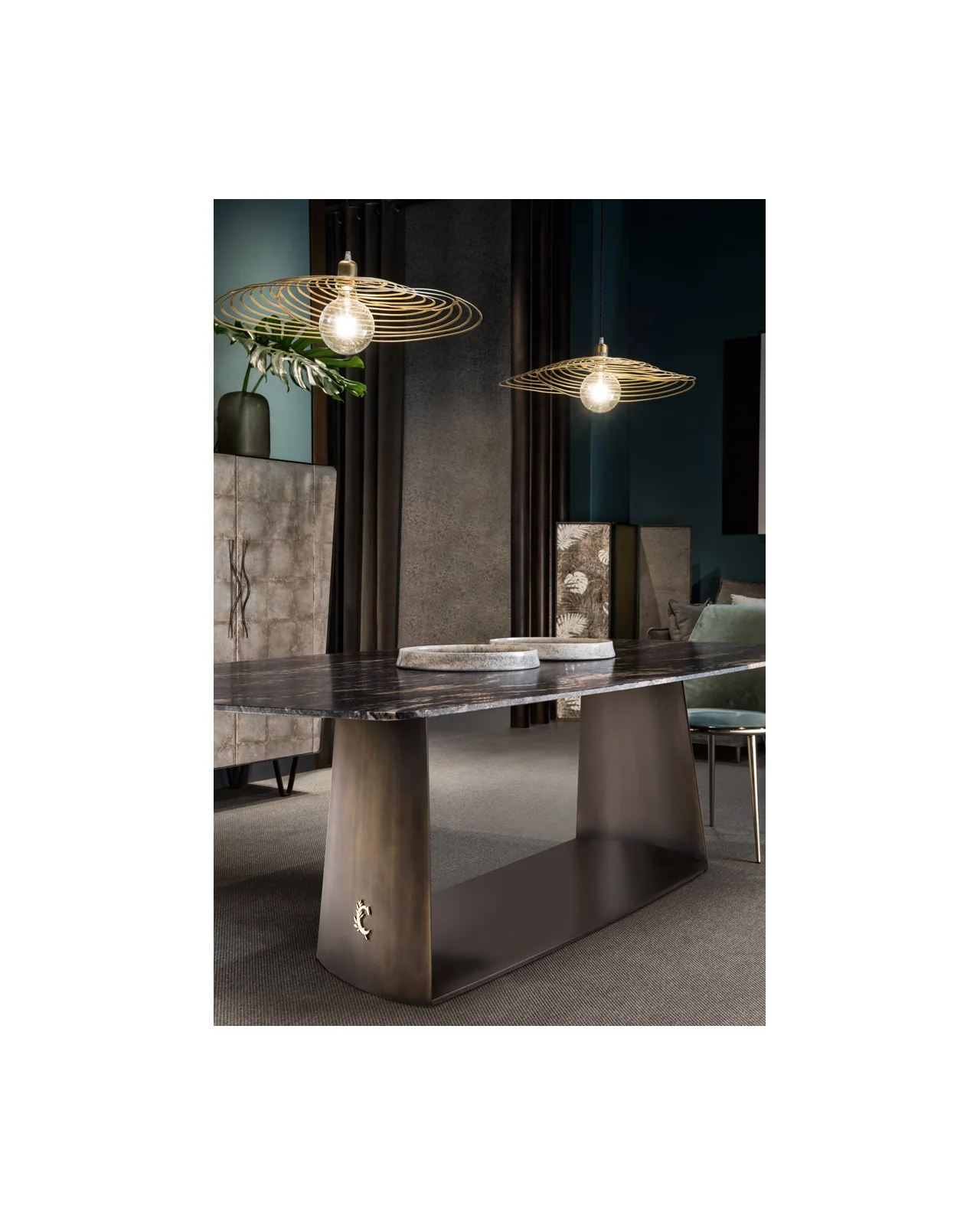 Teseo dining table by Cantori, in an interior setting, photo 2 of 3